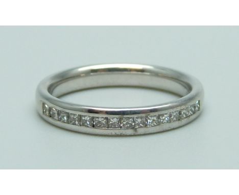 A 9ct white gold and princess cut diamond ring, 0.25ct weight, Clarity SI1, Colour H, with Beaverbrooks diamond certificate, 