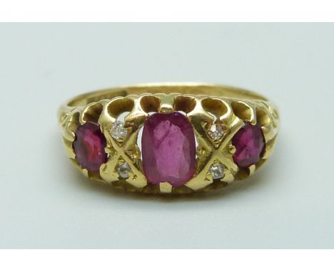 An 18ct gold, ruby and diamond ring, Birmingham 1906, 3.5g, L 