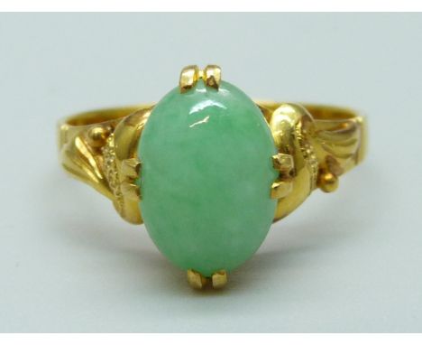 A 22ct gold and jade ring, 2.9g, L 