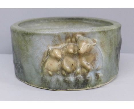 A Langley pottery planter with three bears detail 