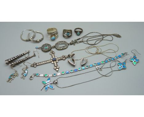 A collection of silver jewellery including a large silver cross pendant set with opal 
