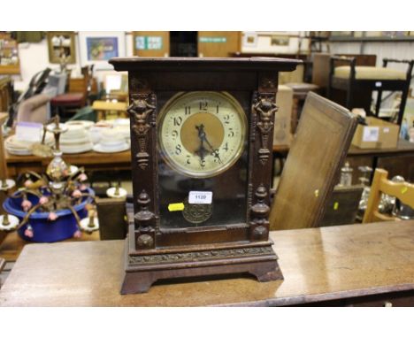 A late 19th Century single hole mantel clock 