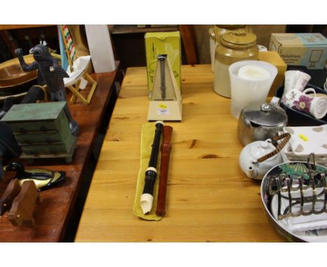 A metronome and two recorders 