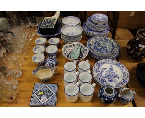 A quantity of various blue and white china to include Spode plates and teacups, Chinese bowls etc. 