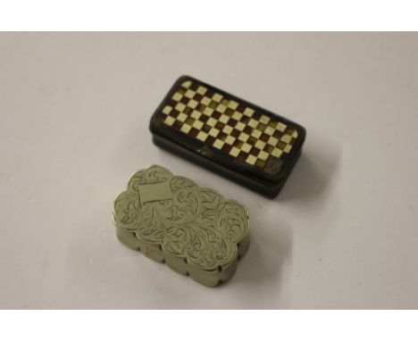 An antique white metal snuff box; and another papier maché and inlaid example 