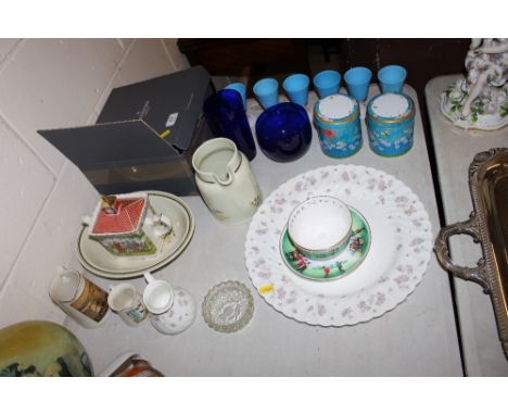 A Waterford crystal glass bowl; together with a Royal Worcester golfing teacup and saucer; a novelty teapot; a Wedgwood "Apri