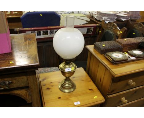 A brass oil lamp 