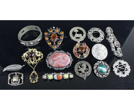 A collection of brooches, to include agate and hardstone set examples, silver Celtic influenced examples etc 