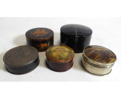 A French metal mounted ebonised snuff box, of circular shape, the lid decorated with soldiers in a courtyard, dia.7.5cm; toge