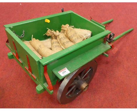 A vintage painted wooden model of a cart, length 77cm
