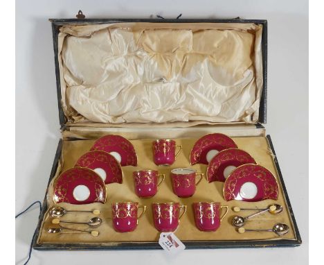 A Royal Doulton six place setting coffee set, comprising cups, saucers, and silver coffee spoons, each having an ivory coffee