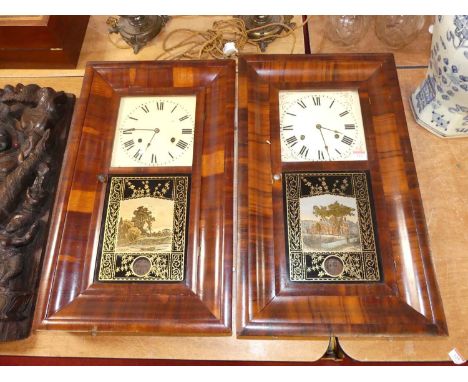 A pair of late 19th century American walnut cased eight day shelf clocks, each 65x39cm