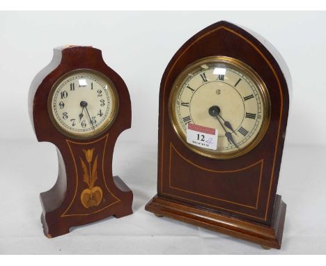 An early 20th century mahogany and boxwood strung lancet strung shaped mantel clock, height 21cm, together with another simil