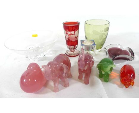 A collection of mixed glassware and polished hardstone animal modelsRuby flashed vase with chip to foot.Hardstone elephant wi