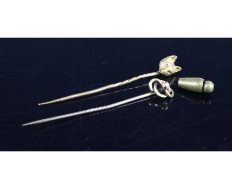 An 18ct gold tie-pin fashioned as a fox mask, 2.6g; together with a 15ct gold example, 1.2g, in single fitted leather case (2