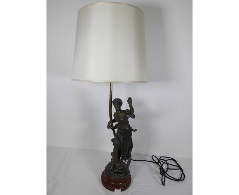 A late 19th century French spelter figure, converted into a table lamp, height 84cm including shade