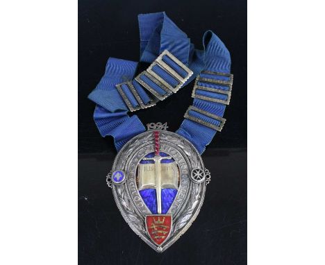 A George V silver and enamel jewel for the Golders Green Parliament, with sash, 9 x 7cm