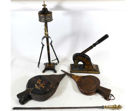 A pair of 20th century style black lacquered fire bellows, together with another pair of bellows, fire tools, and a gilt flor
