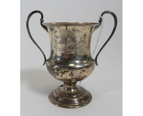 A George V silver twin handled trophy, engraved D.A. Buchanan Poole Shooting Prize 2nd Loretto 1950, London 1923, h.11cm, 3.6