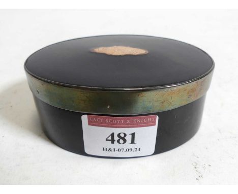 A 19th century pressed horn table snuff box, the lid with inset yellow metal cartouche, having engraved decoration, w.9cm 