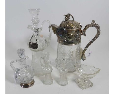 A cut glass claret jug having silver plated mounts with vine finial and Bacchus mask spout, height 26cm, together with other 