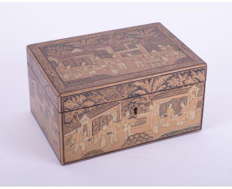 Tea Caddy, a 19th century Chinese Export gilt lacquered with rising lid and lead interior, height 9cm, width 17cm, with key