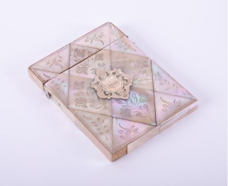 An antique mother of pearl 'calling card' case with leaf &amp; flowering engraving and an ornate silver plaque with engraving