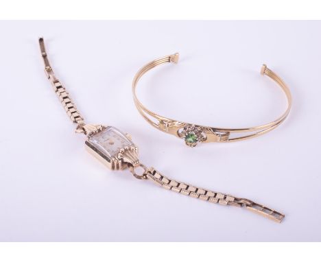 A 9ct yellow gold cased ladies Rotary wristwatch with a rolled gold bracelet, total weight 12.37gm &amp; a yellow gold 'Cladd