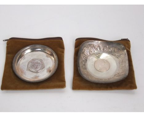 Two similar Indian trinket dishes, each centrally fitted with an Indian rupee, one dated 1862, the other 1919, 3oz approx (2)
