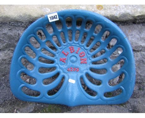 A vintage cast iron tractor/implement seat with pierced detail and lettering Albion and number 4329 (later painted finish)