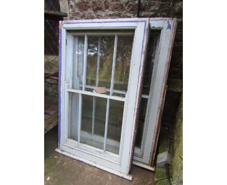 A reclaimed painted pine framed sash window with segmented glazed panels together with a matching slightly smaller example, 1