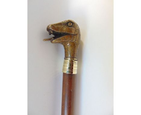 Malacca walking stick with cast bronze snake head knop