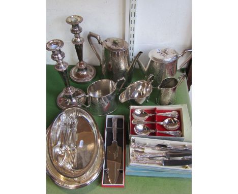 A mixed collection of silver plate to include a four piece oval tea service, engraved with wild flowers, a pair of tall Sheff