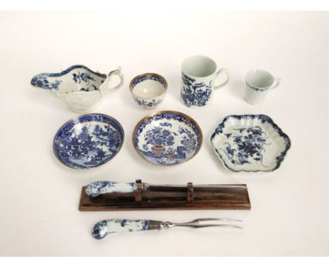 An 18th century Worcester type sauce boat with relief moulded floral detail and blue and white painted floral decoration to t