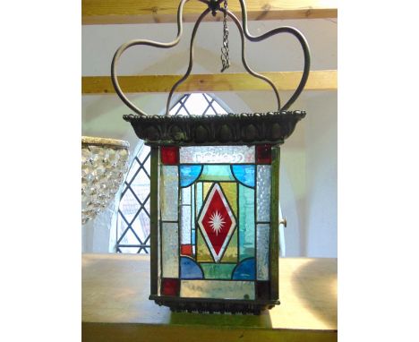 Copper and leaded glass square hall light fitted with coloured glass star cut panels, 62cm high