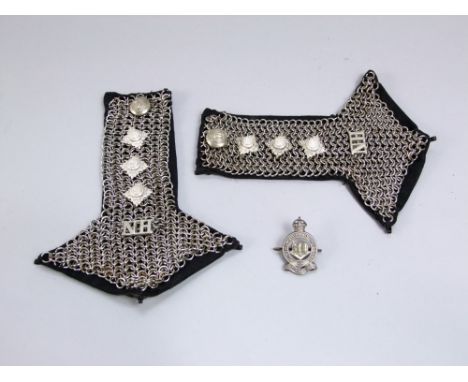 A pair of Northumberland Regiment chain mail shoulder lapels and a Hussars lapel badge, South Africa, 19 oz