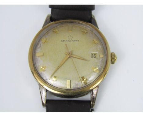 Eterna-matic gold plated gentleman's wrist watch with fancy baton markers and subsidiary date dial, leather strap 