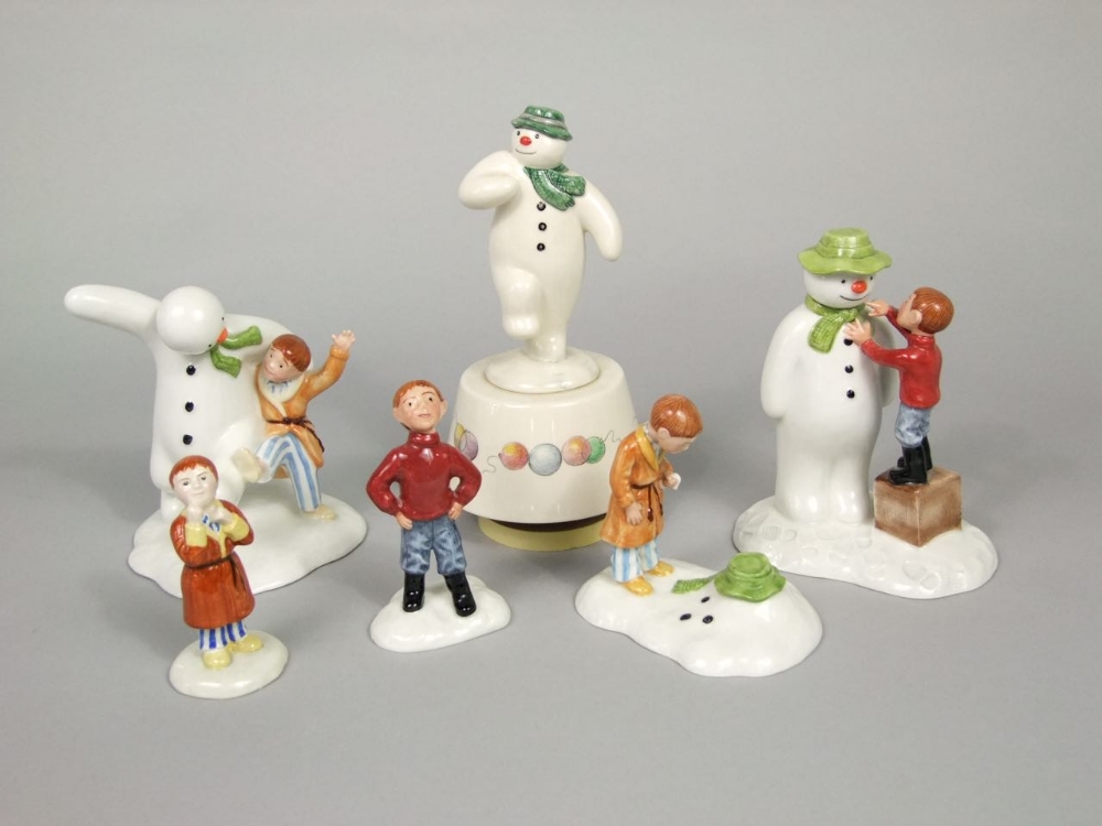 A collection of Royal Doulton The Snowman series wares comprising a ...