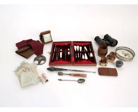A leather cased etui fitted with 13 needlework and other tools, crocodile skin card case, moose head medallion, miniature Dou