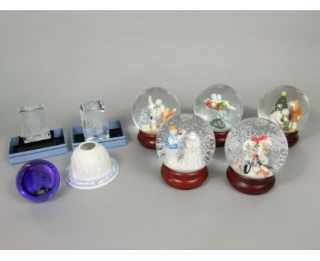 A collection of ceramics and glassware relating to The Snowman by Raymond Briggs comprising five Coalport glitter and snow gl