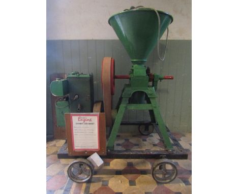 A Lister stationary engine powering a corn kibbler, type D, 1.5hp, serial number 118220, engine circa 1935, corn kibbler 1950