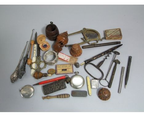 A mixed collection, silver handled manicure tools, teakwood vesta from HMS Iron Duke, corkscrews, etc