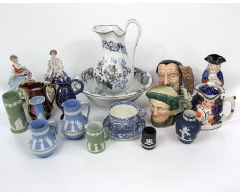 Two large Royal Doulton character jugs, Auld Mac, and Merlin, D6529, A tea pot in the form of a double sided Toby, further To