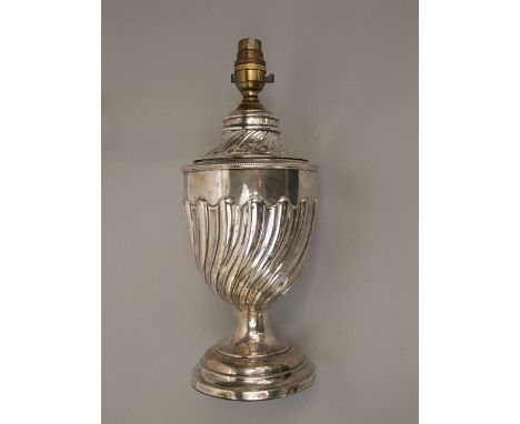 Victorian silver wrythen fluted baluster lamp, with brass fittings upon a stepped square base, maker JDWD, 35cm high