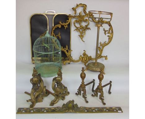A mixed metalware lot to include an antique cast ormolu pair of chenets with centre piece, pair of fire dogs, rococo ormolu f