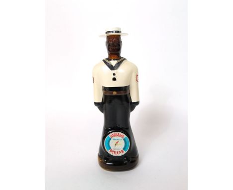 A vintage Barbados rum harbour police novelty liquor bottle, in the form of a sailor, 33cm high