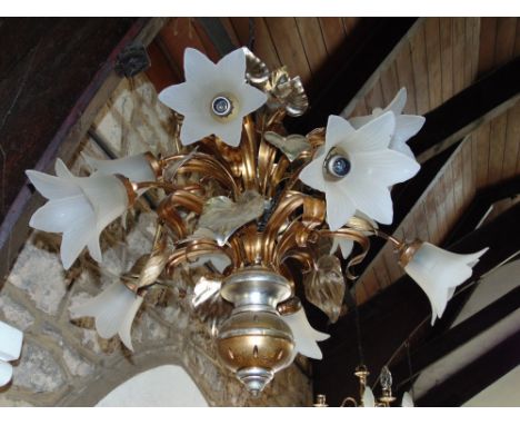 Impressive gilt metal and wood ceiling light with scrolled branches and floral fluted glass shades