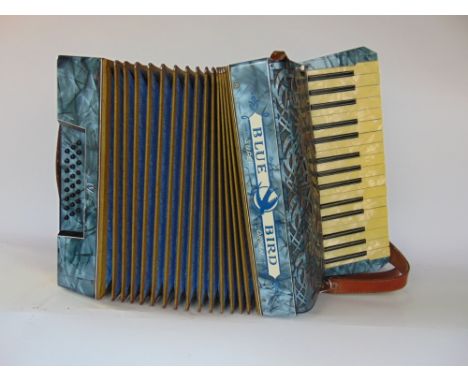 A vintage cased Bluebird Super Organ Accordion