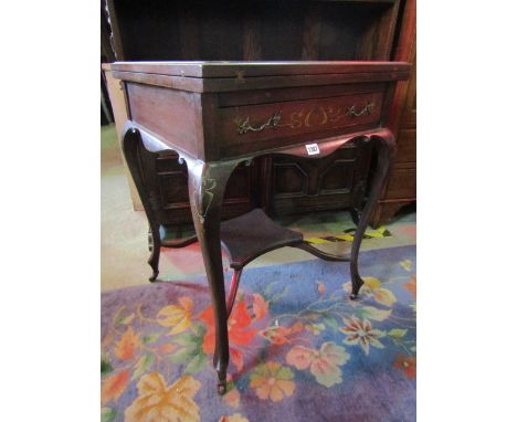 An Edwardian mahogany envelope card table with painted (to simulate inlay) Art Nouveau style floral detail, frieze drawer, sh