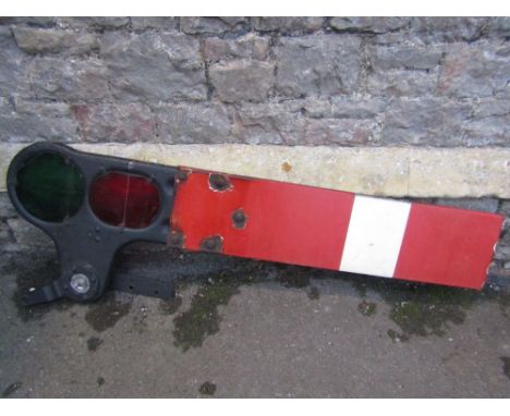 A reclaimed cast iron and enamel railway signalling arm with coloured glass reflectors, with printed lettering Garnier 2/70